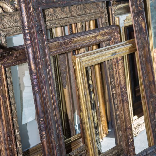 Stack of Golden Wooden Vintage Frames, Indoors.